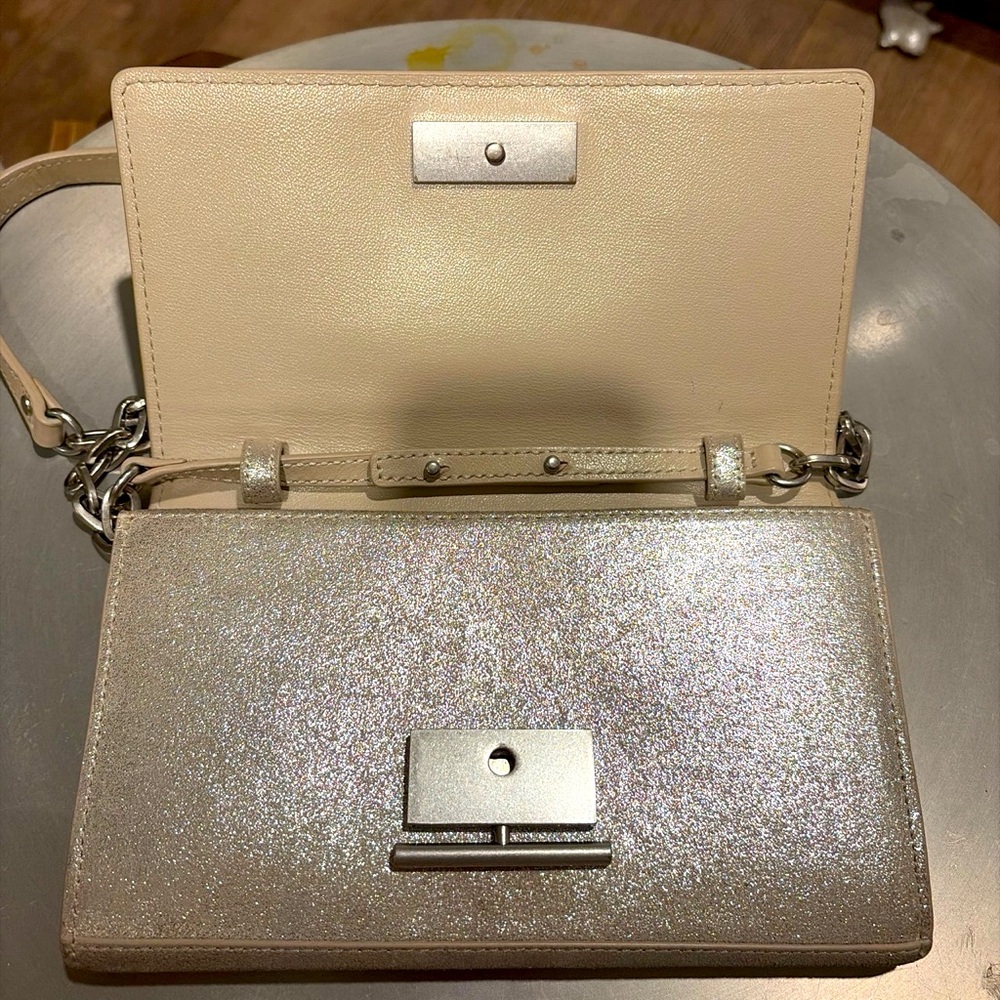 Ampersand As Apostrophe "Space Metallic" Right Angle Clutch